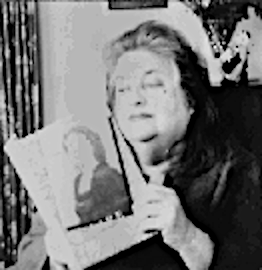 Danielle de Rosso reading a book