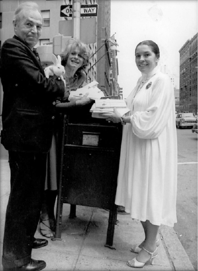 James and Clarissa Mason holding a white rabbit
